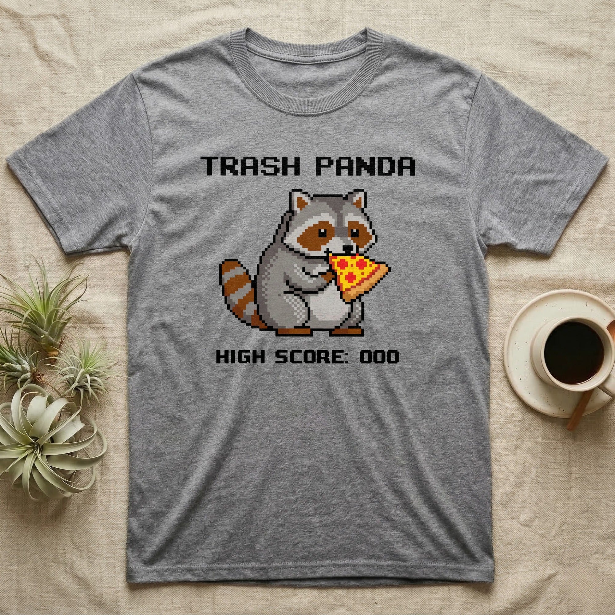 Pixel art raccoon eating pizza with text "TRASH PANDA HIGH SCORE: 000".