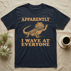 Bearded Dragon Engraving T-Shirt in Navy — Antique green engraving of a bearded dragon raising one arm between the words APPARENTLY and I WAVE AT EVERYONE