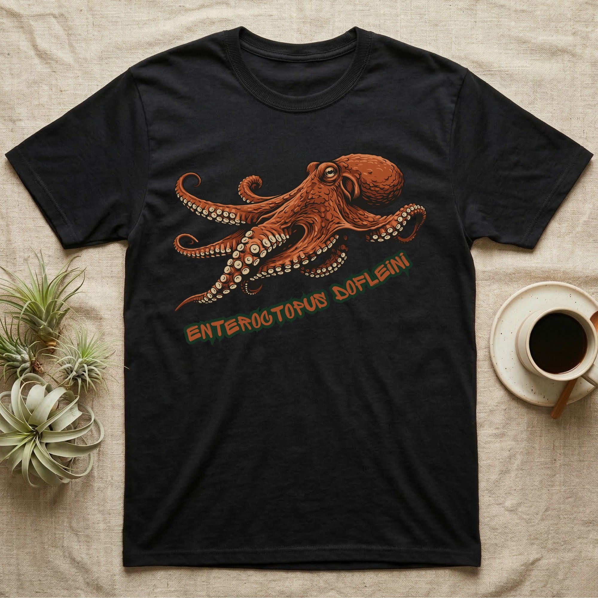 Black t-shirt with an orange octopus design and text "ENTERCTOPUS DOFLEINI".