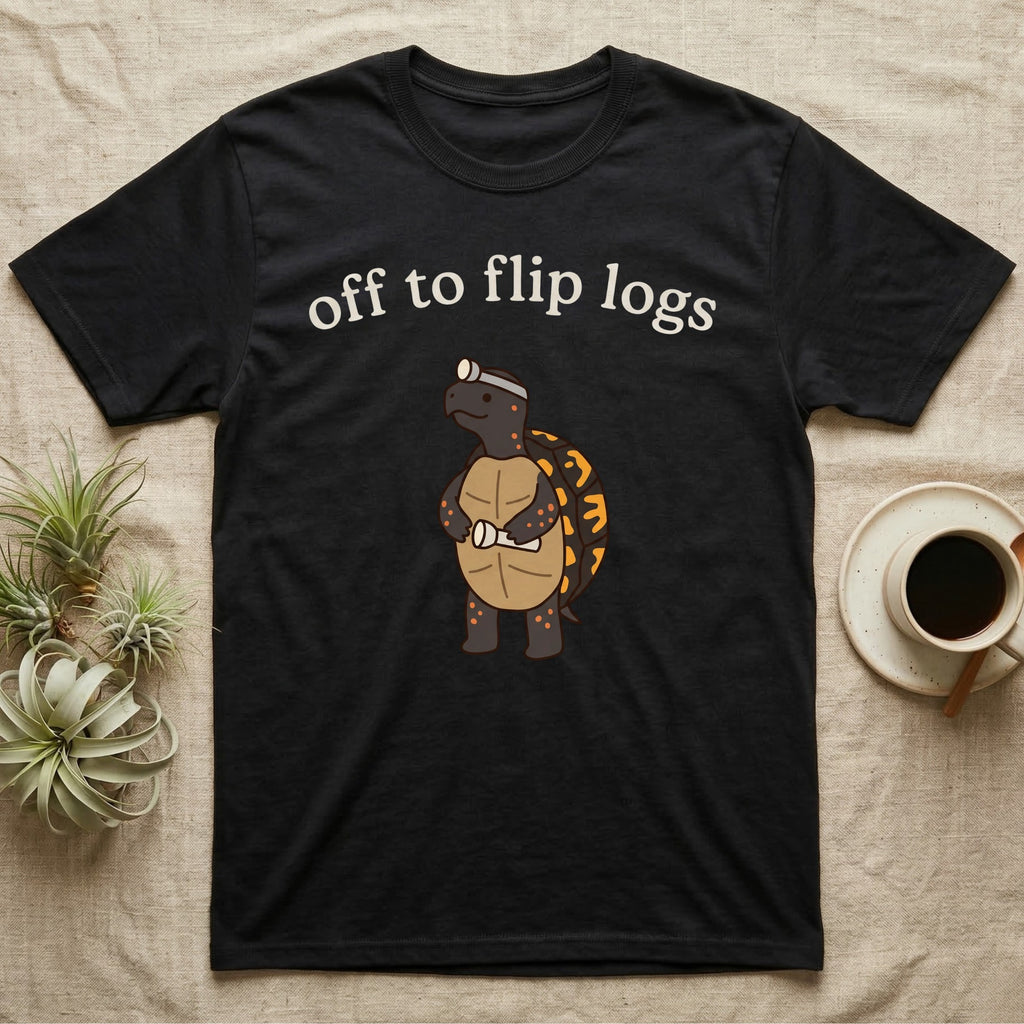 Box Turtle Herping T-Shirt in Black — Minimal doodle of an eastern box turtle standing upright in a headlamp holding a flashlight, under the words off to flip logs