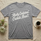 Reptile Cricket Escape T-Shirt in Sport Grey — Distressed off-white 1970s brush script reading Mostly Contained, Crickets Aren't, climbing a diagonal on charcoal grey