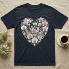 Dark t-shirt with a heart-shaped floral design featuring a praying mantis.
