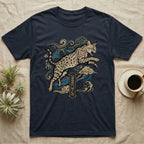 Dark t-shirt with a leaping spotted cat, clouds, and "URBAN WILD" text.