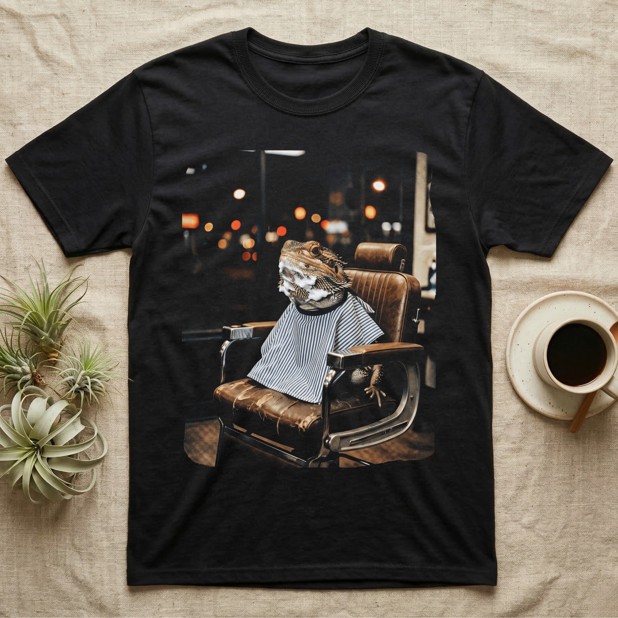 Bearded dragon in a barber chair with shaving cream and a blue striped cape.