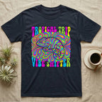 Black t-shirt with psychedelic chameleon and "TROPICAL TRIP VIBE SHIFTER" text.