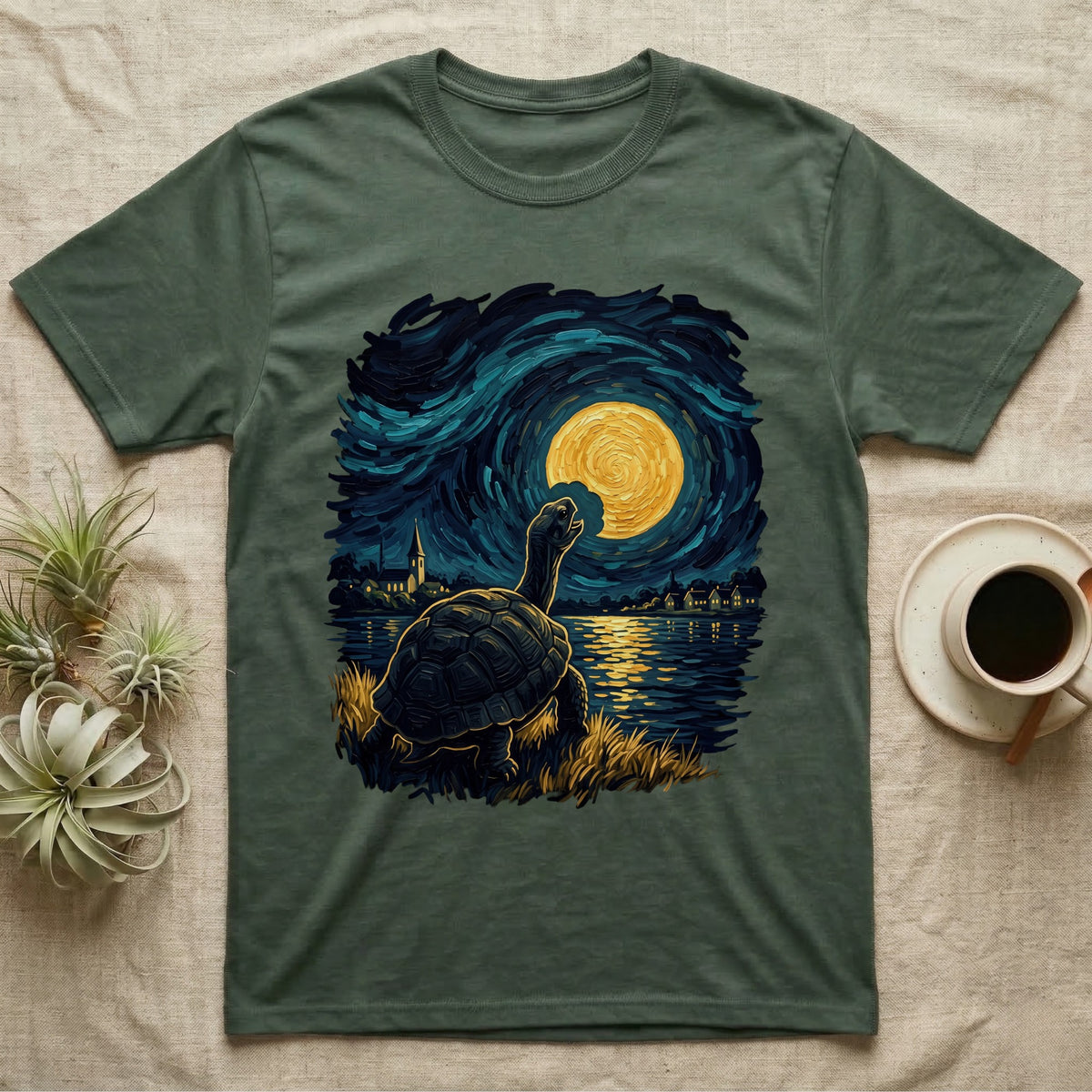 Hermann's Tortoise Moon T-Shirt in Military Green — Painted Hermann's tortoise seen from behind, neck stretched up, biting a piece out of a golden spiral moon in a swirling blue night sky over a lake
