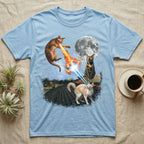 Light blue t-shirt with cats shooting laser beams and fireballs at the moon.