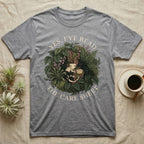 Crested Gecko Care Sheet T-Shirt in Sport Grey — Botanical wreath of pothos and moss circling a crested gecko, closed by two arcs of Roman capitals.