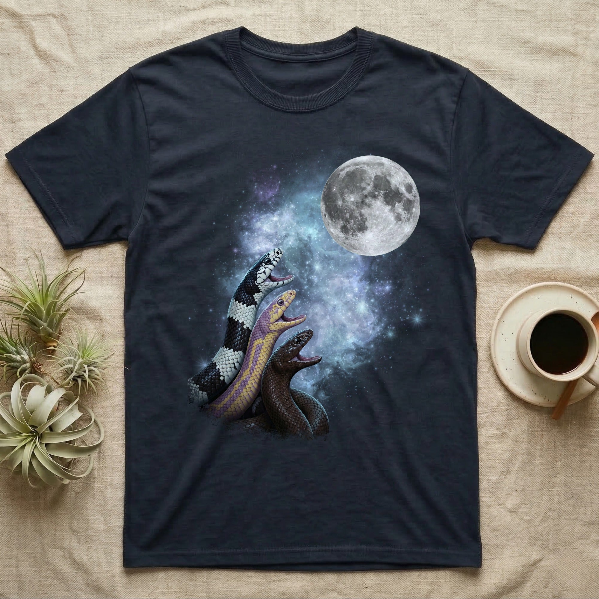 California Kingsnake Moon Howl T-Shirt in Navy — Three California Kingsnake colour morphs howling at a full moon over a nebula on a dark grey t-shirt.