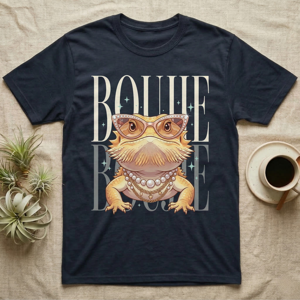 Dark t-shirt with a cartoon bearded dragon wearing sunglasses and pearl necklace.