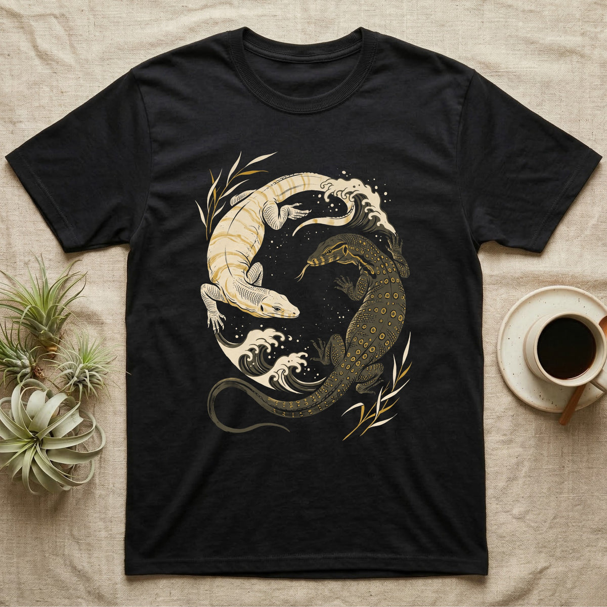 Water Monitor Yin-Yang T-Shirt in Black — Woodblock print of two Asian water monitors, one charcoal and one albino, curled nose to nose into a circle with river waves