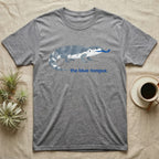 Grey t-shirt with blue-tongued skink graphic and "the blue-tongue." text.