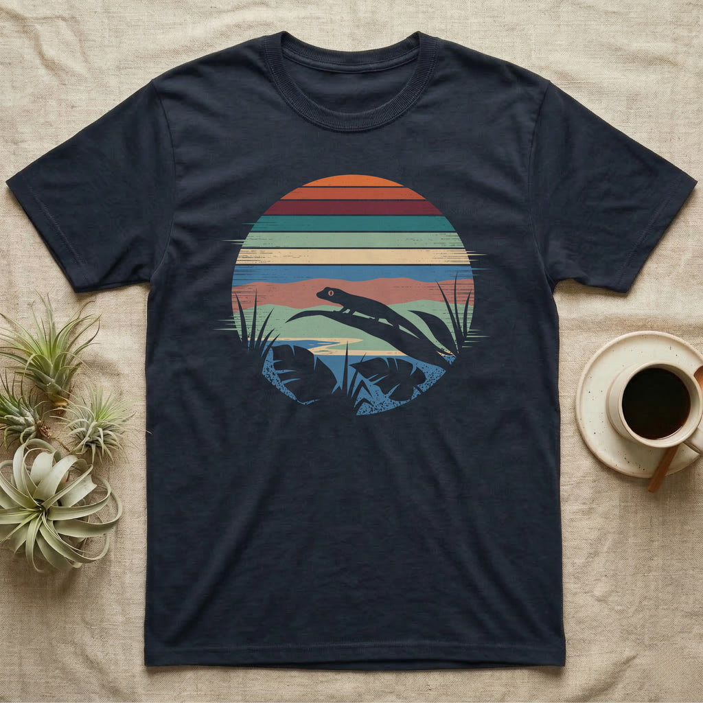 Mourning Gecko Window T-Shirt in Navy — Mourning gecko silhouetted on a leaf inside a broken circular window of flat stepped rainforest colour bands.