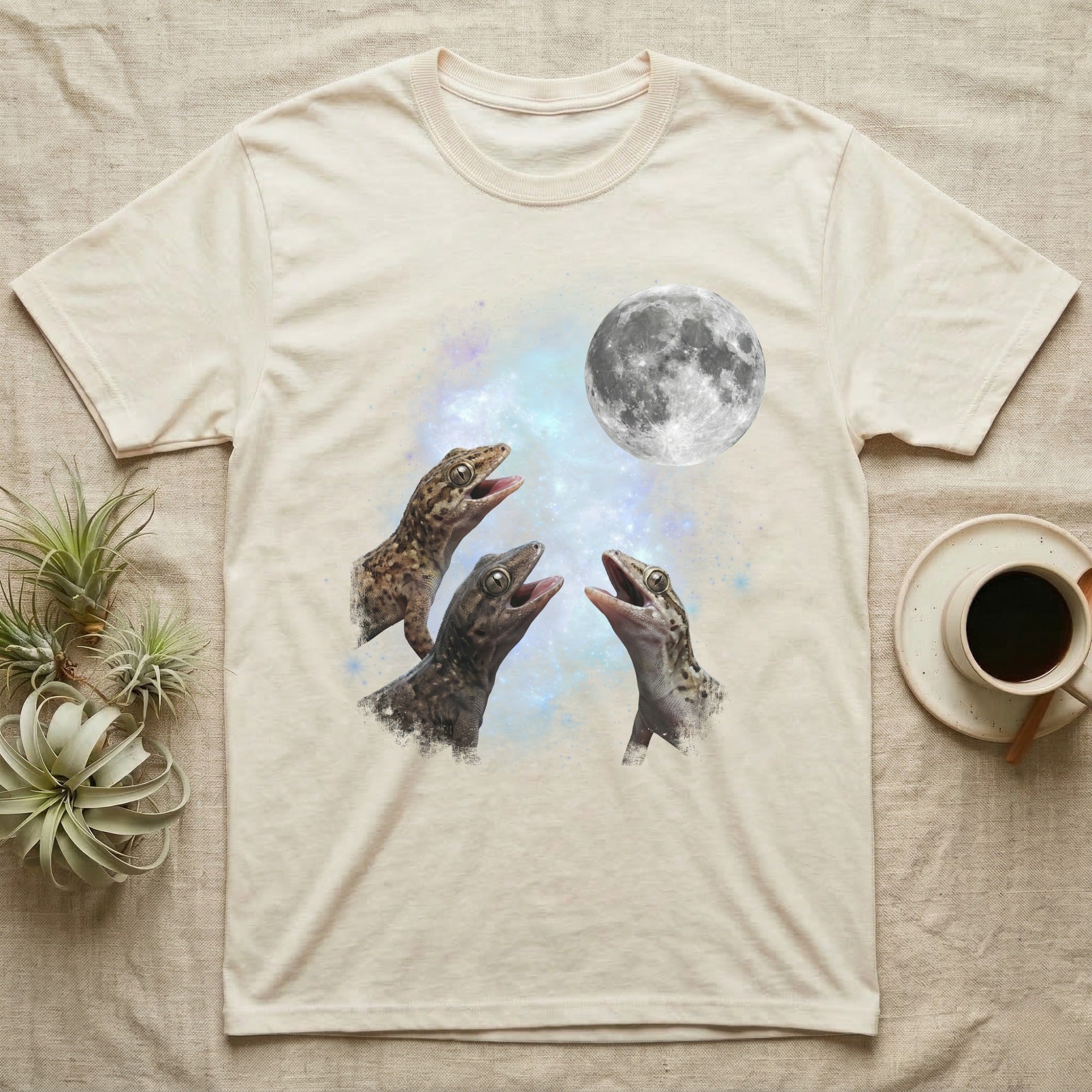 Mourning Gecko Moon Howl T-Shirt in Natural — Three Mourning Gecko colour morphs howling at a full moon over a nebula on a dark grey t-shirt.