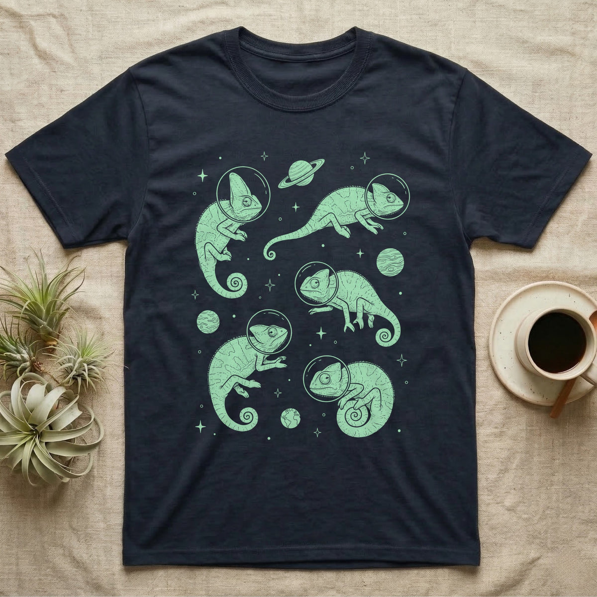 Veiled Chameleon Cosmic T-Shirt in Navy — Vintage screen-print illustration of veiled chameleons in astronaut helmets floating in space, cosmic nebula mint green monochromatic on dark background.