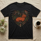 Black t-shirt with a heart-shaped floral design featuring a dachshund.