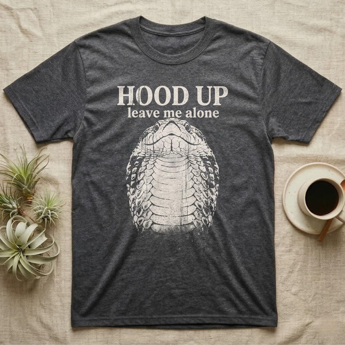 Hognose Hood Up T-Shirt in Dark Heather — Gritty white print of a western hognose reared up front-on with its neck flattened, under the words HOOD UP, leave me alone, on black
