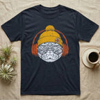Corn Snake Chill Beats T-Shirt in Navy — Engraved corn snake in a knit beanie and headphones, aviator lenses reflecting a leafy forest floor.