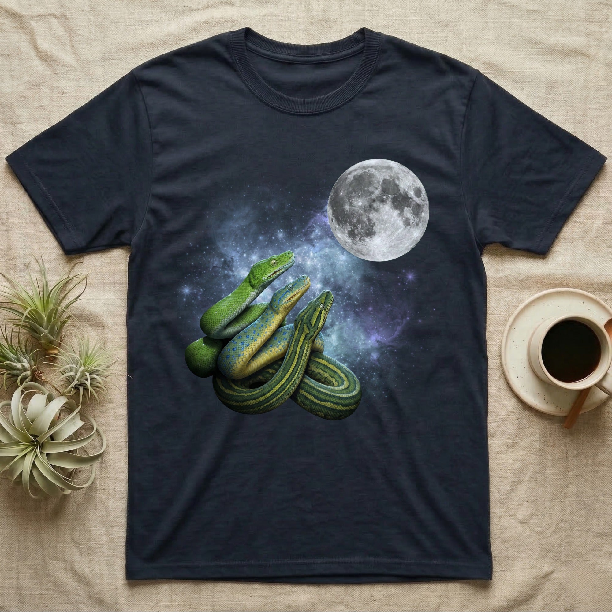 Green Tree Python Moon Howl T-Shirt in Navy — Three Green Tree Python colour morphs howling at a full moon over a nebula on a dark grey t-shirt.