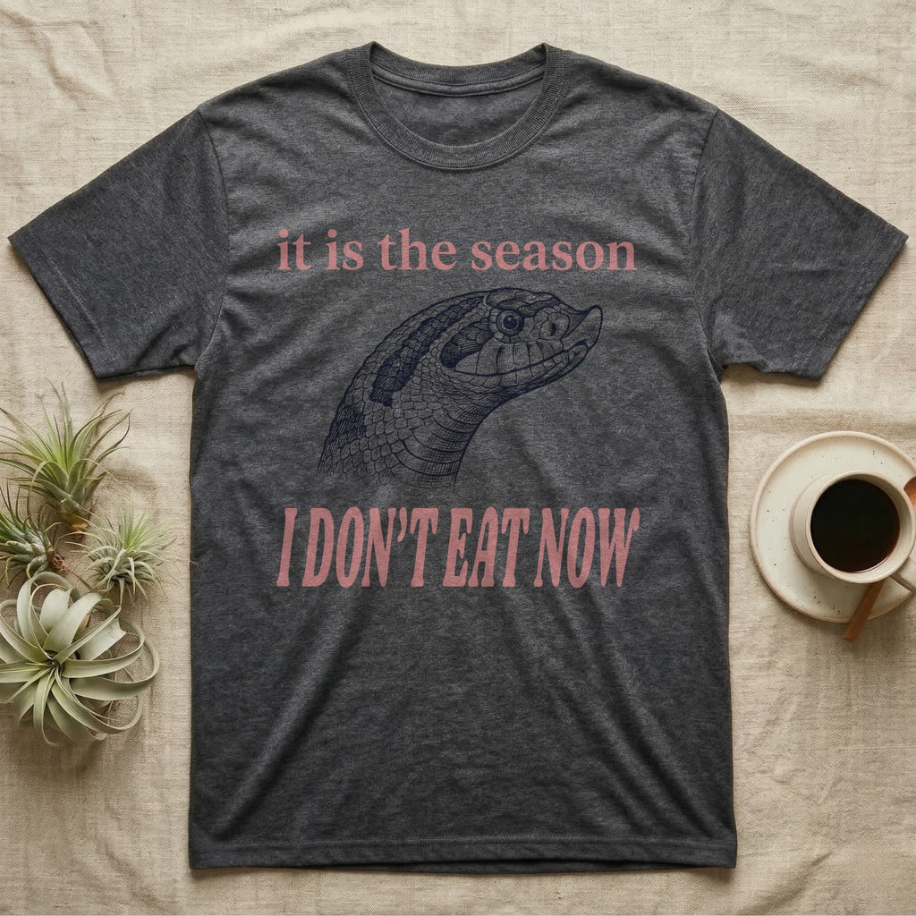 Hognose Fasting Season T-Shirt in Dark Heather — Engraved western hognose snake head in profile, snout raised, under large retro lettering reading I DON'T EAT NOW.