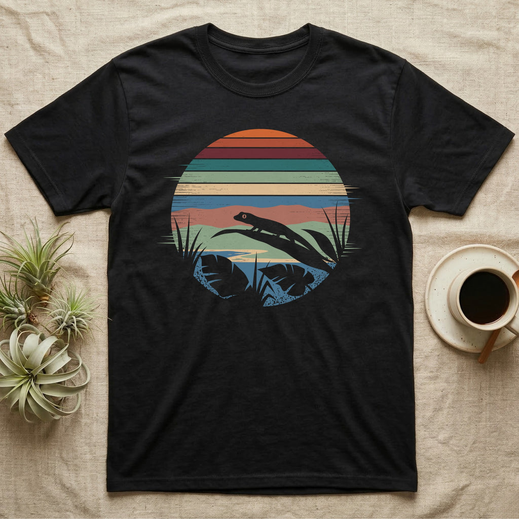 Mourning Gecko Window T-Shirt in Black — Mourning gecko silhouetted on a leaf inside a broken circular window of flat stepped rainforest colour bands.