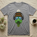T-shirt with a green dinosaur wearing headphones, sunglasses, and a beanie.