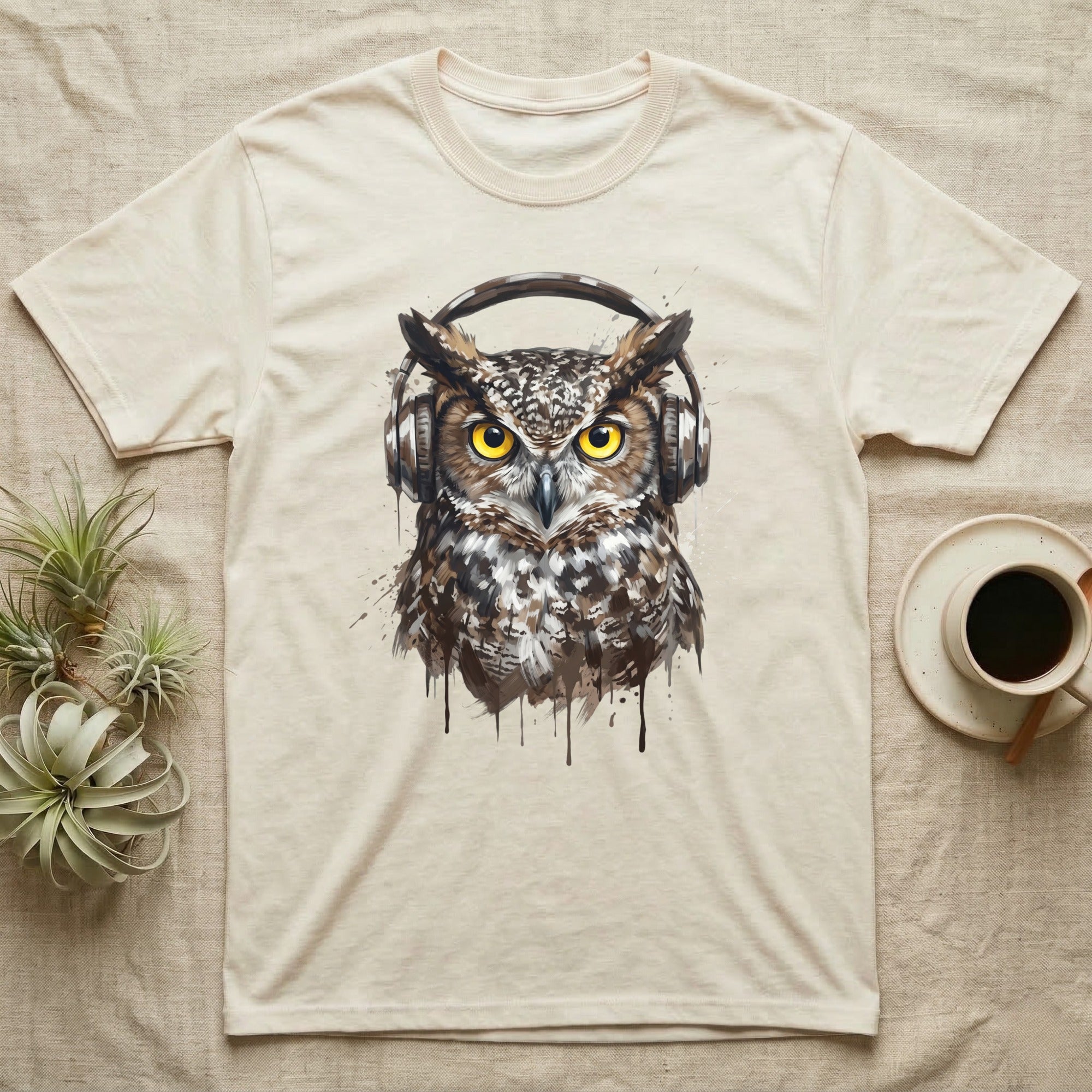 T-shirt with watercolor painting of an owl wearing headphones.
