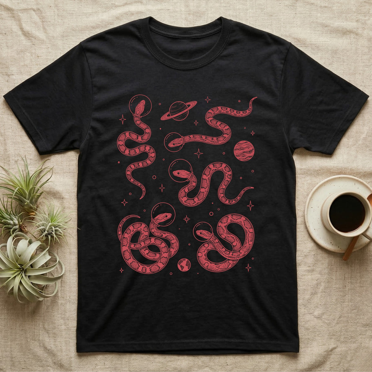Corn Snake Cosmic T-Shirt in Black — Vintage screen-print illustration of corn snakes in astronaut helmets floating in space, cosmic crimson monochromatic on dark background.