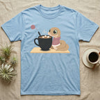 Hognose Snake Knitted Sweater T-Shirt in Light Blue — Soft-painted illustration of a hognose snake in a knitted jumper resting beside a mug of cocoa with marshmallows.