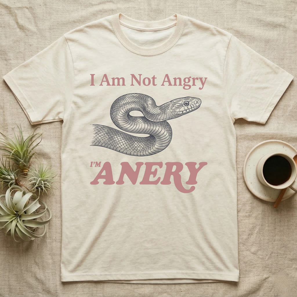 Anery Corn Snake T-Shirt in Natural — Engraved corn snake curled into an S between the words I Am Not Angry and I'm ANERY in dusty rose type.