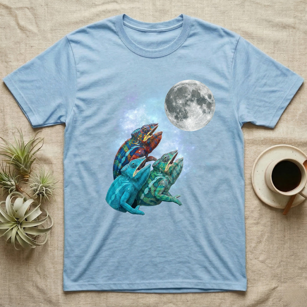Panther Chameleon Moon Howl T-Shirt in Light Blue — Three Panther Chameleon colour morphs howling at a full moon over a nebula on a dark grey t-shirt.