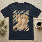 Dark t-shirt with cowboy boots, gecko, and "Golden Hour Gecko" text.
