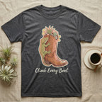 Dark t-shirt with a cowboy boot, gecko, and "Climb Every Boot" text.