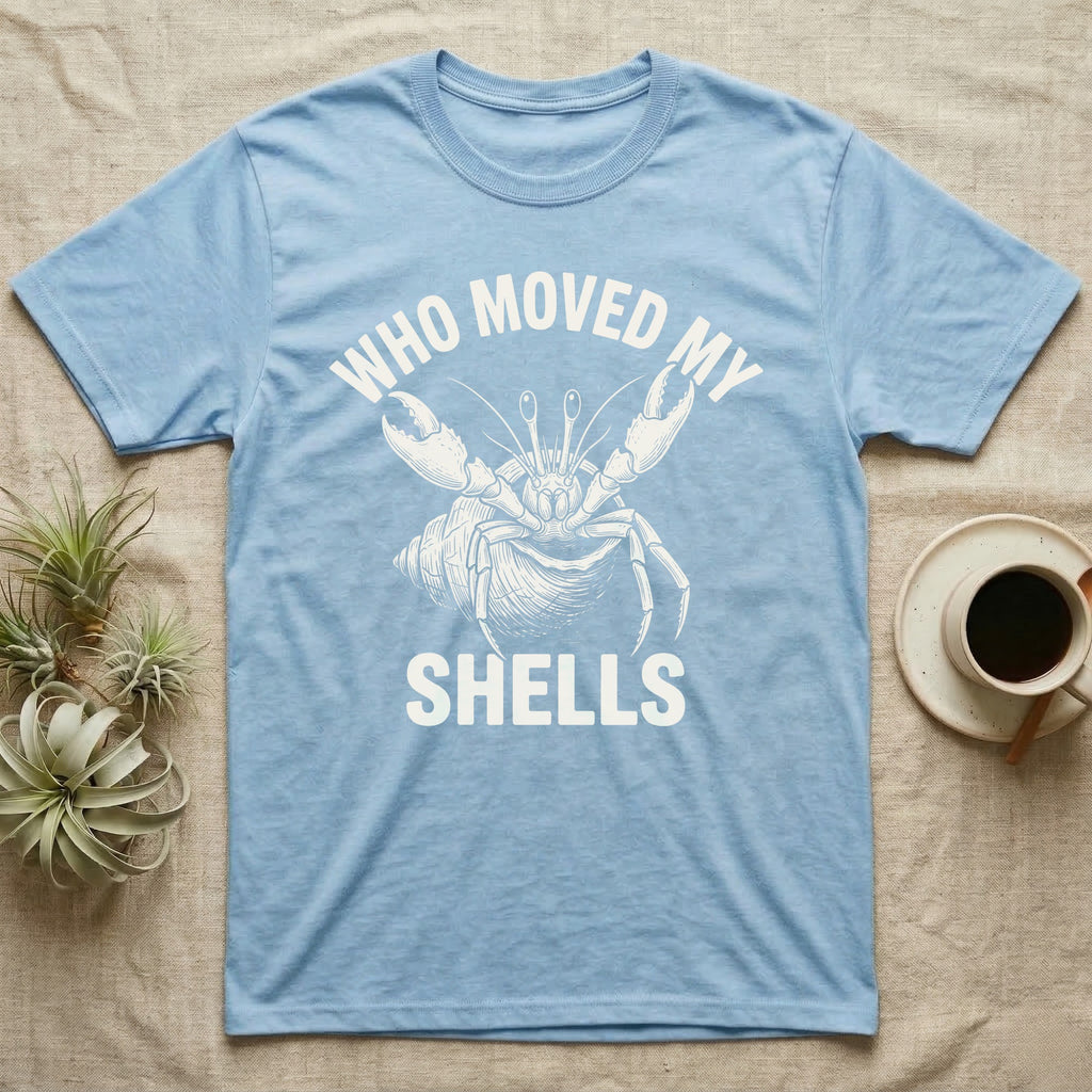 Hermit Crab Outrage T-Shirt in Light Blue — White-line engraving of a hermit crab flinging both claws up under the words Who Moved My Shells