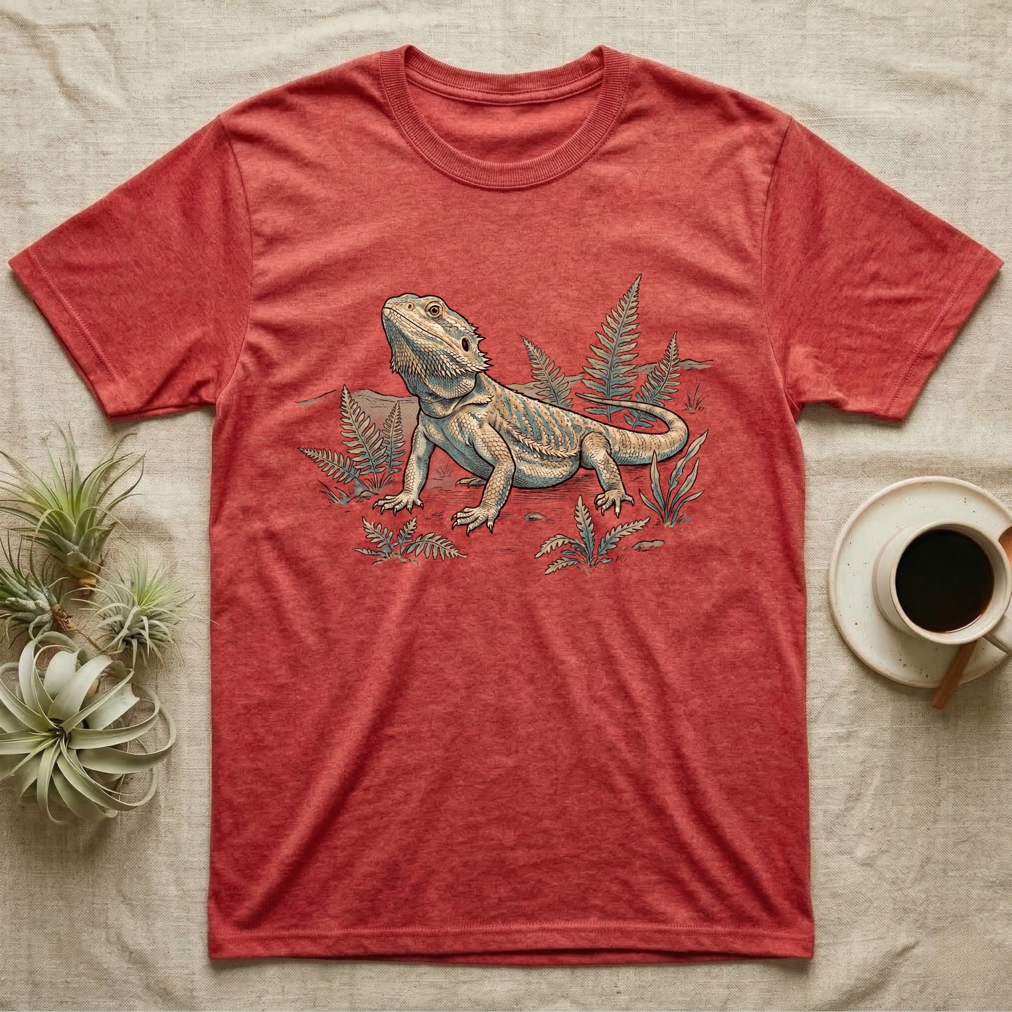 Bearded Dragon Dinosaur T-Shirt in Heather Red — Faded 90s nature-doc illustration of a bearded dragon posed in profile as a tiny dinosaur specimen on a field plate.