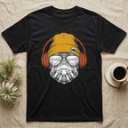 Red-Eared Slider Headphones T-Shirt in Black — Engraved red-eared slider turtle in a beanie and headphones, aviators reflecting a calm reed-lined lake.