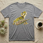 Illustration of a smiling leopard gecko with a plump curled spotted tail, bold vintage-comic ink outlines and halftone shading, graphic-only, no text. — shown on a Sport Grey tee.