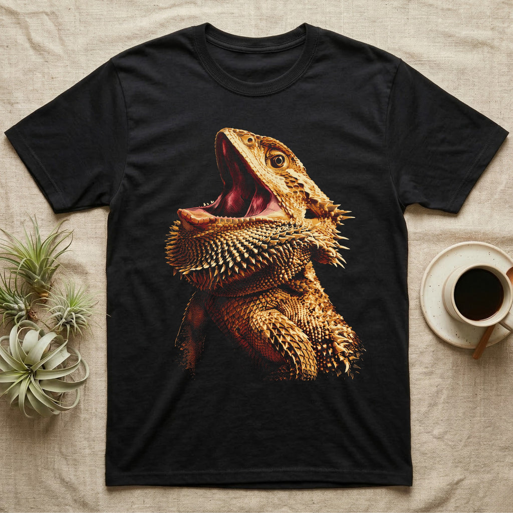 Vintage comic screen-print illustration of a bearded dragon with mouth open wide and beard fully flared, graphic-only, no text. — shown on a Black tee.