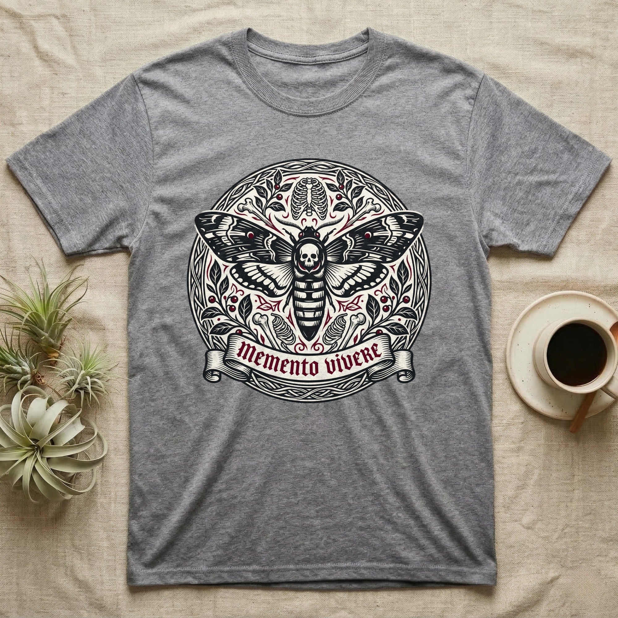 Grey t-shirt with Memento Vivere moth design.