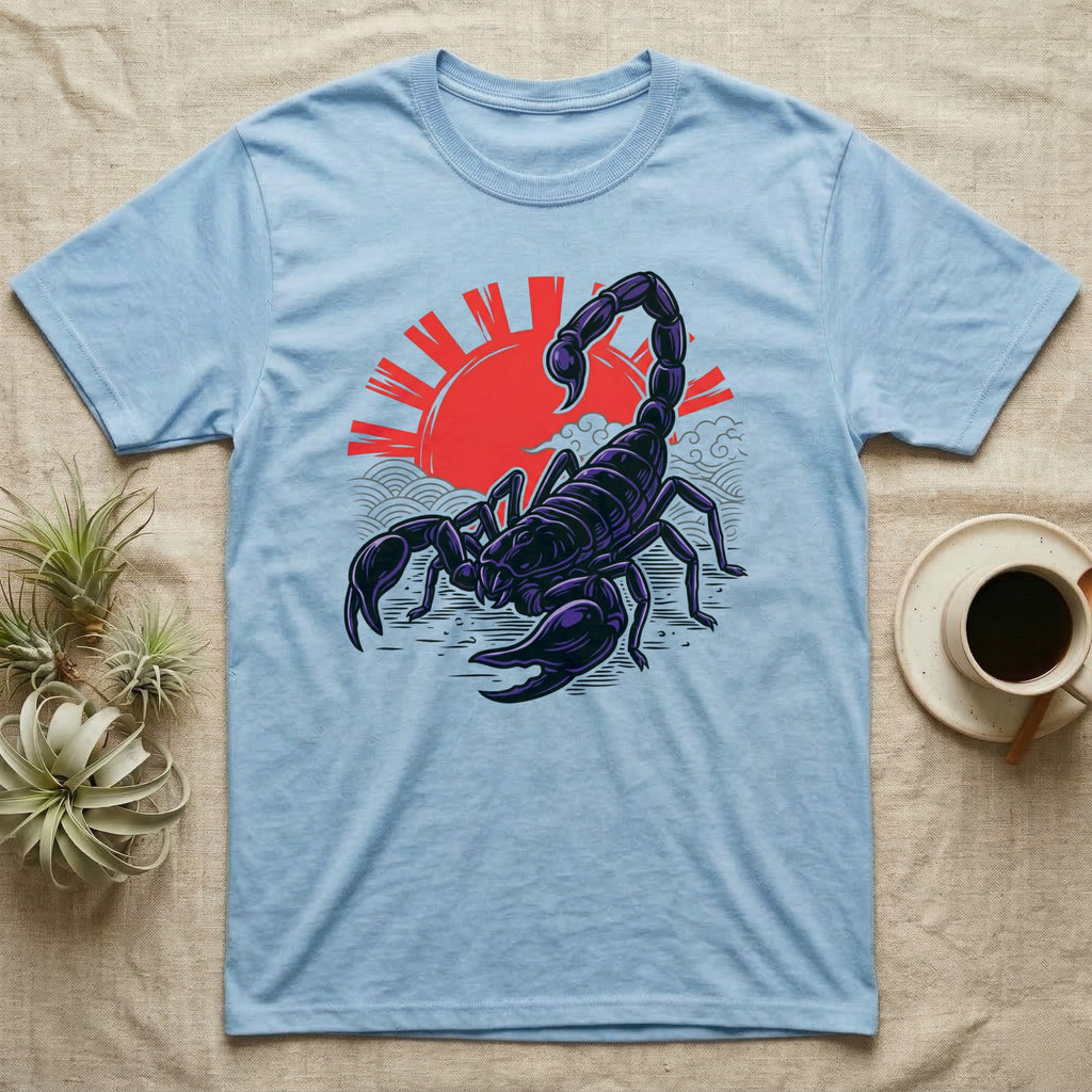 Light blue t-shirt with a black scorpion against a rising sun design.
