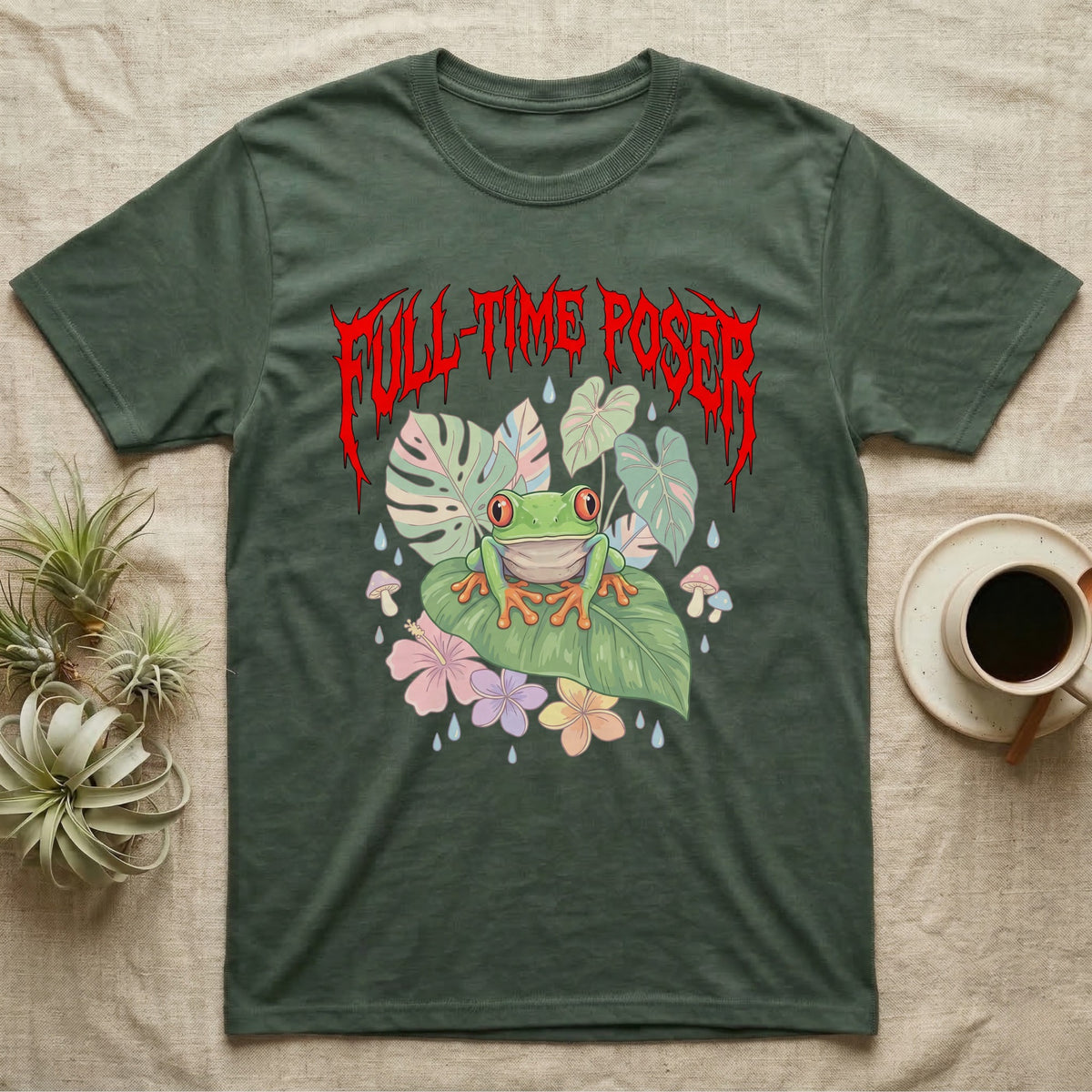 Red-Eyed Tree Frog Feral T-Shirt in Military Green — Red-eyed tree frog on a leaf in a pastel jungle scene under a spiky red metal wordmark reading FULL-TIME POSER.