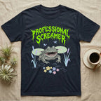Budgett's Frog Feral T-Shirt in Navy — Budgett's frog with wide screaming mouth under jagged acid-green metal text PROFESSIONAL SCREAMER with lily pads