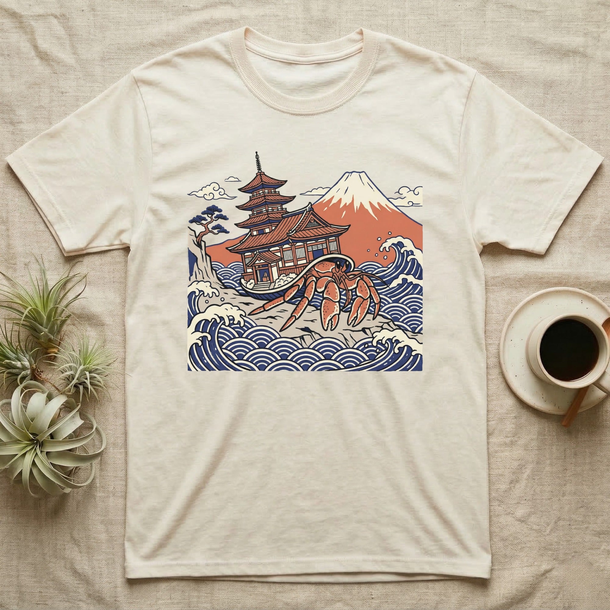 Cream t-shirt with Japanese temple, Mount Fuji, and a large crab in waves.