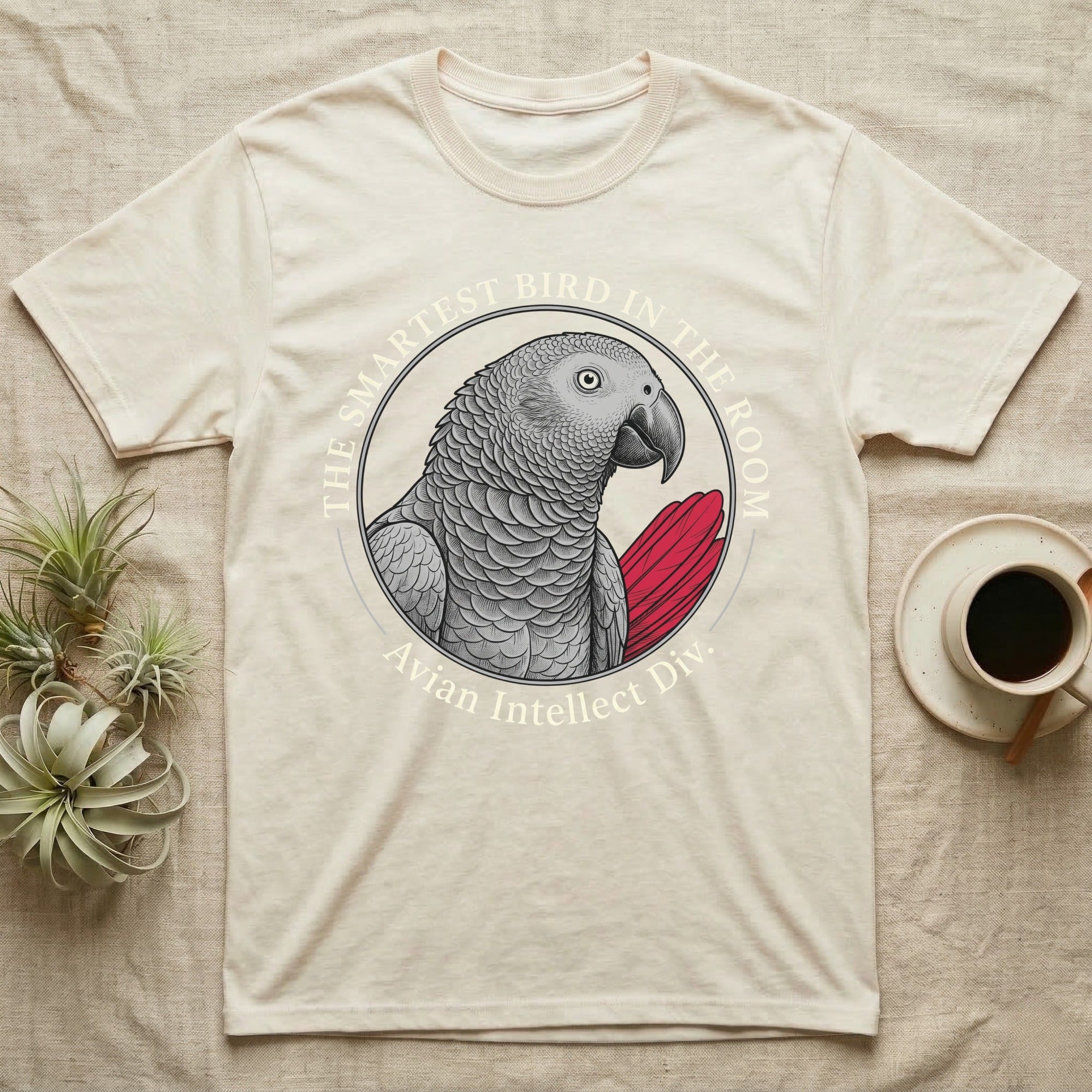 T-shirt with a gray parrot and "The Smartest Bird In The Room Avian Intellect Div." text.