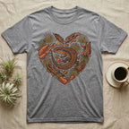 Grey t-shirt with a heart-shaped design of a lizard and natural elements.