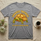 Gray t-shirt with Sulcata tortoise graphic and text "MY HEIR'S PROBLEM NOW."