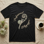 Black t-shirt with "Professional Lollygagger" text and a snail on a fern frond.