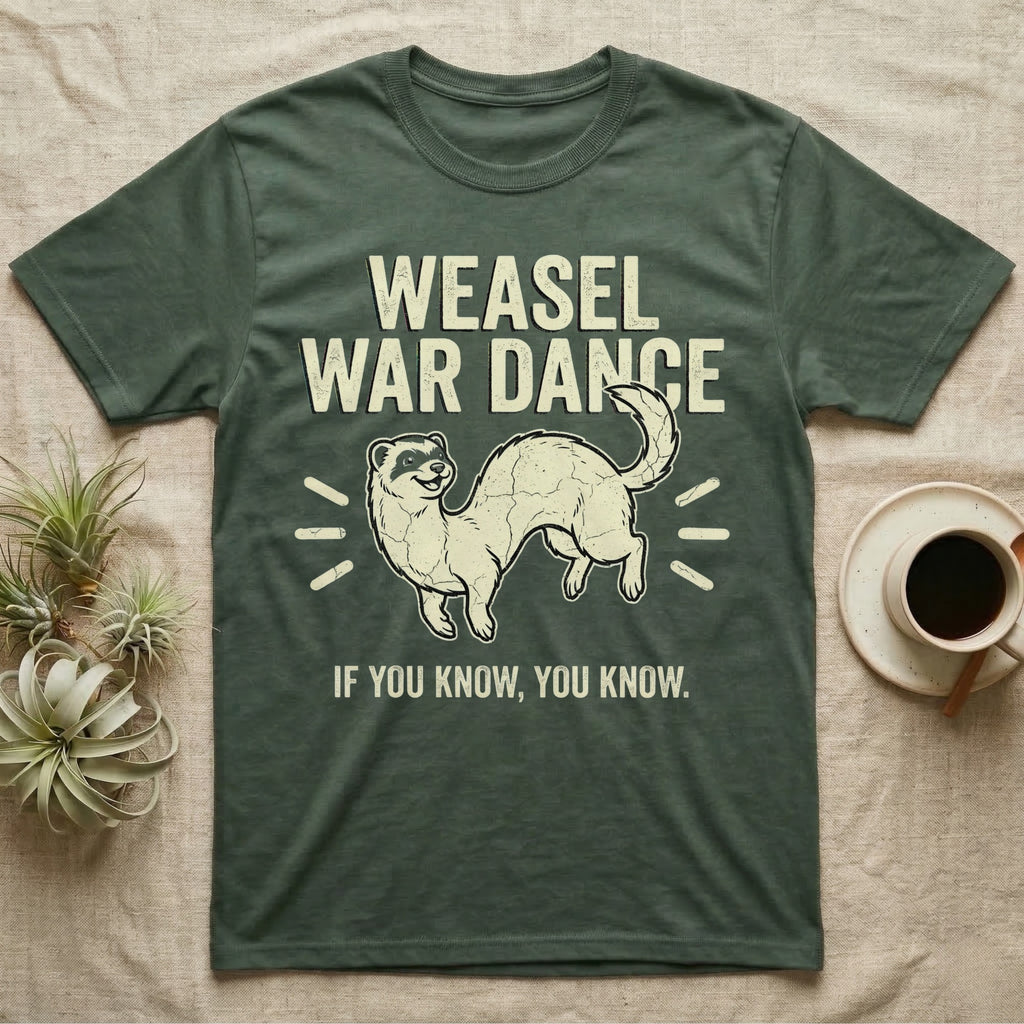 Weasel War Dance Ferret Tee in Military Green — Grunge-distressed ferret mid-war-dance in S-curve bounce with stacked type "Weasel War Dance / If You Know."