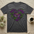 Dark grey t-shirt with a heart design of purple orchids, green leaves, and a purple crab.