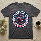 Crested Gecko 1776 T-Shirt in Dark Heather — Distressed crest of a crested gecko in a top hat with text Don't Tread On Me and I Lick My Own Eyes.